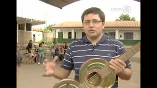 Children's Orchestra Play Instruments Made from Trash