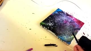 نقاشی کهکشان با آب کردن مدادشمعی