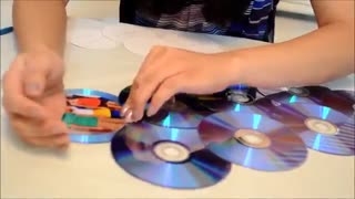 قاب عکس از سی دی های بدرد نخور