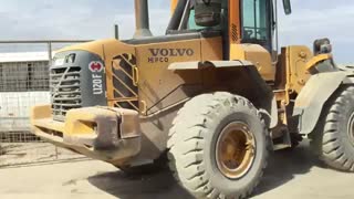 لودر - ماشین آلات راهسازی