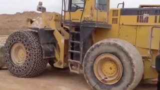 زنجیر لودر - ماشین آلات راهسازی